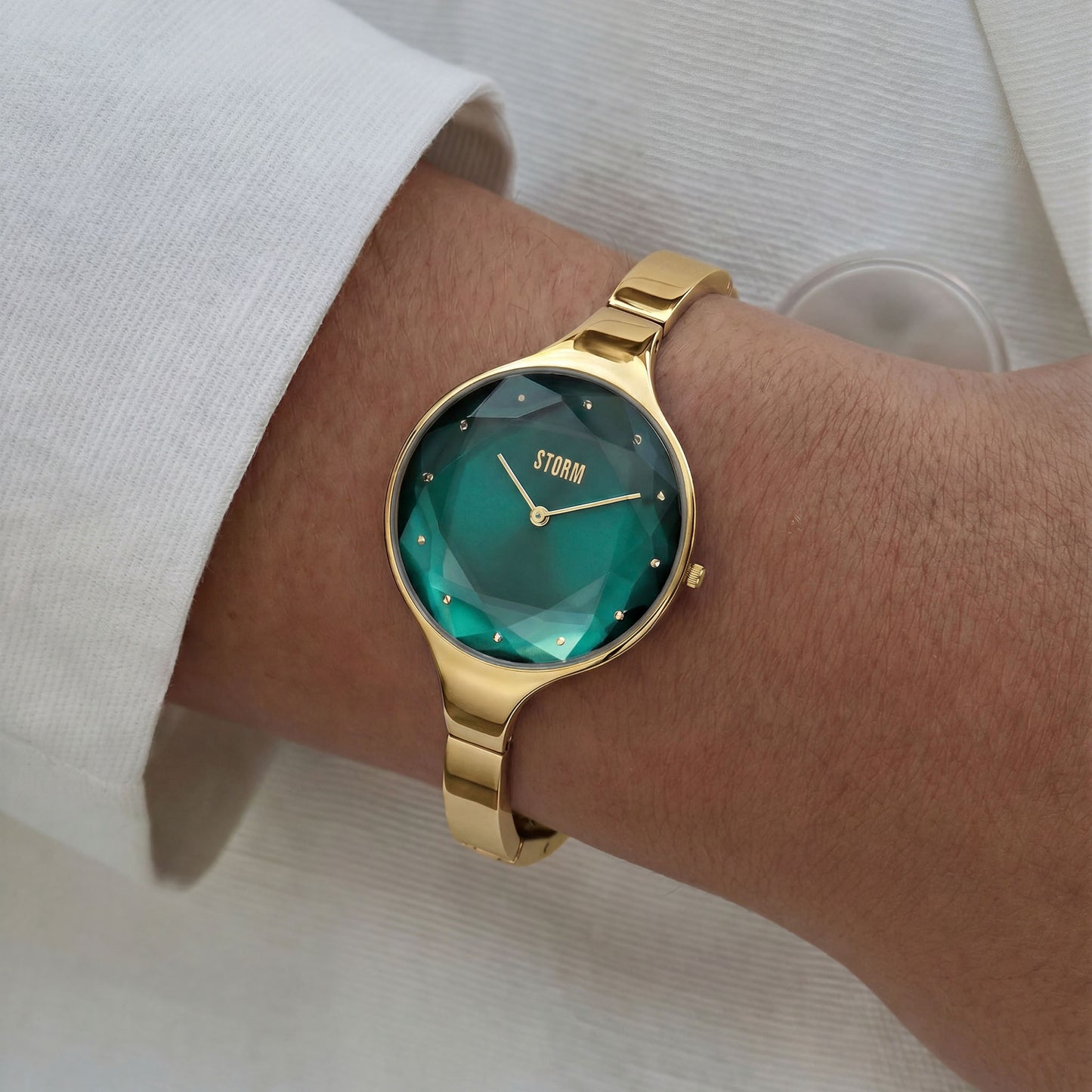 CRISTOLA GOLD GREEN WRIST VIEW 1