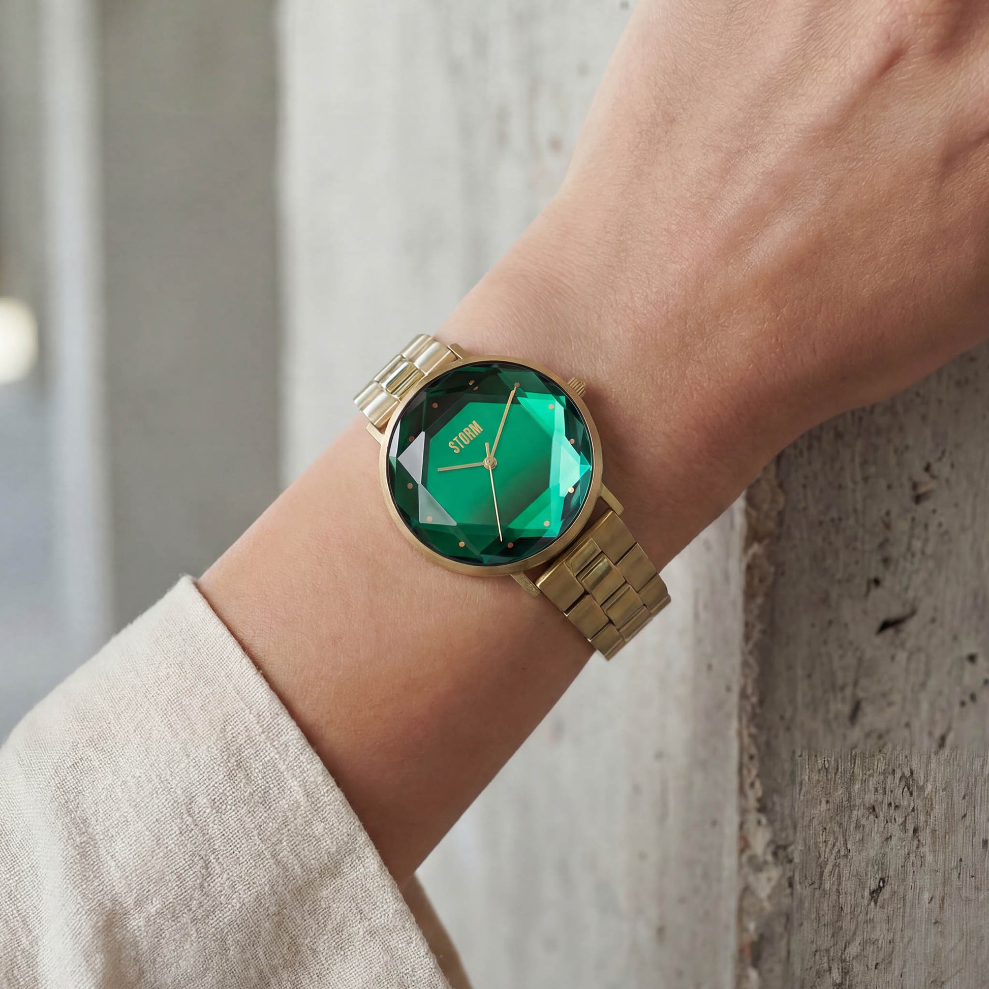 ELEXI GOLD LAZER GREEN WRIST VIEW