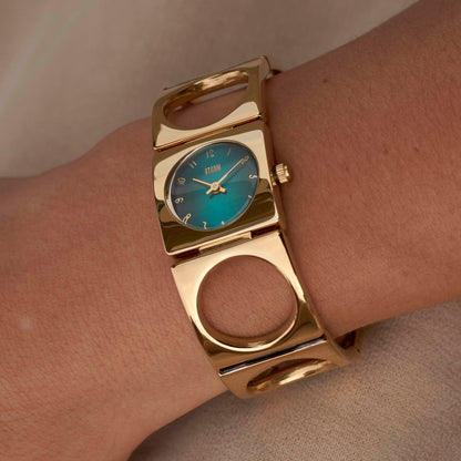 GROOVY V2 GOLD TEAL WRIST 1