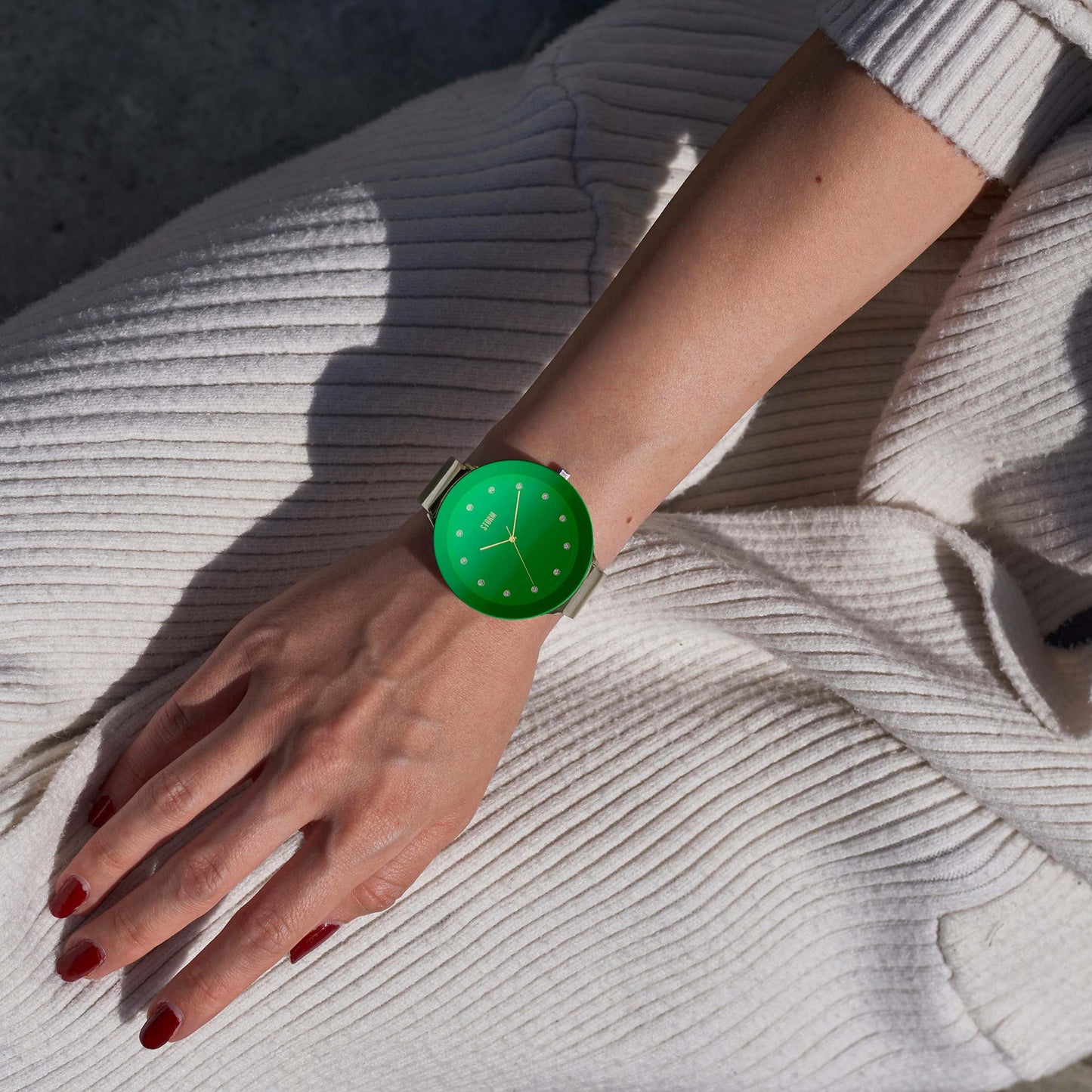 OSTELE GOLD LAZER GREEN WRIST 1