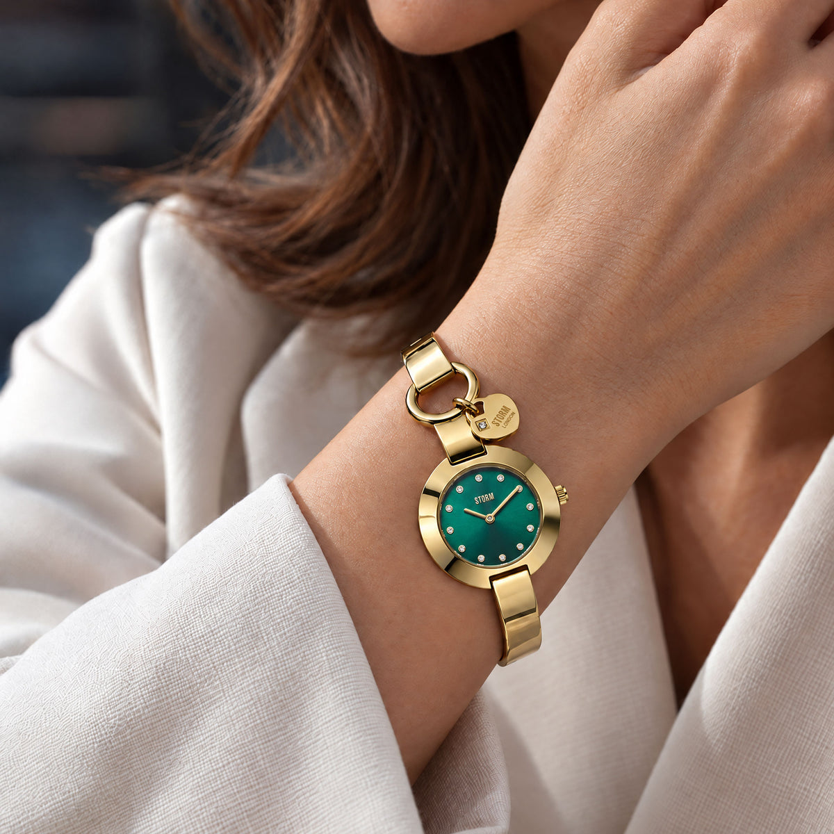 STORMELE GOLD GREEN WRIST VIEW