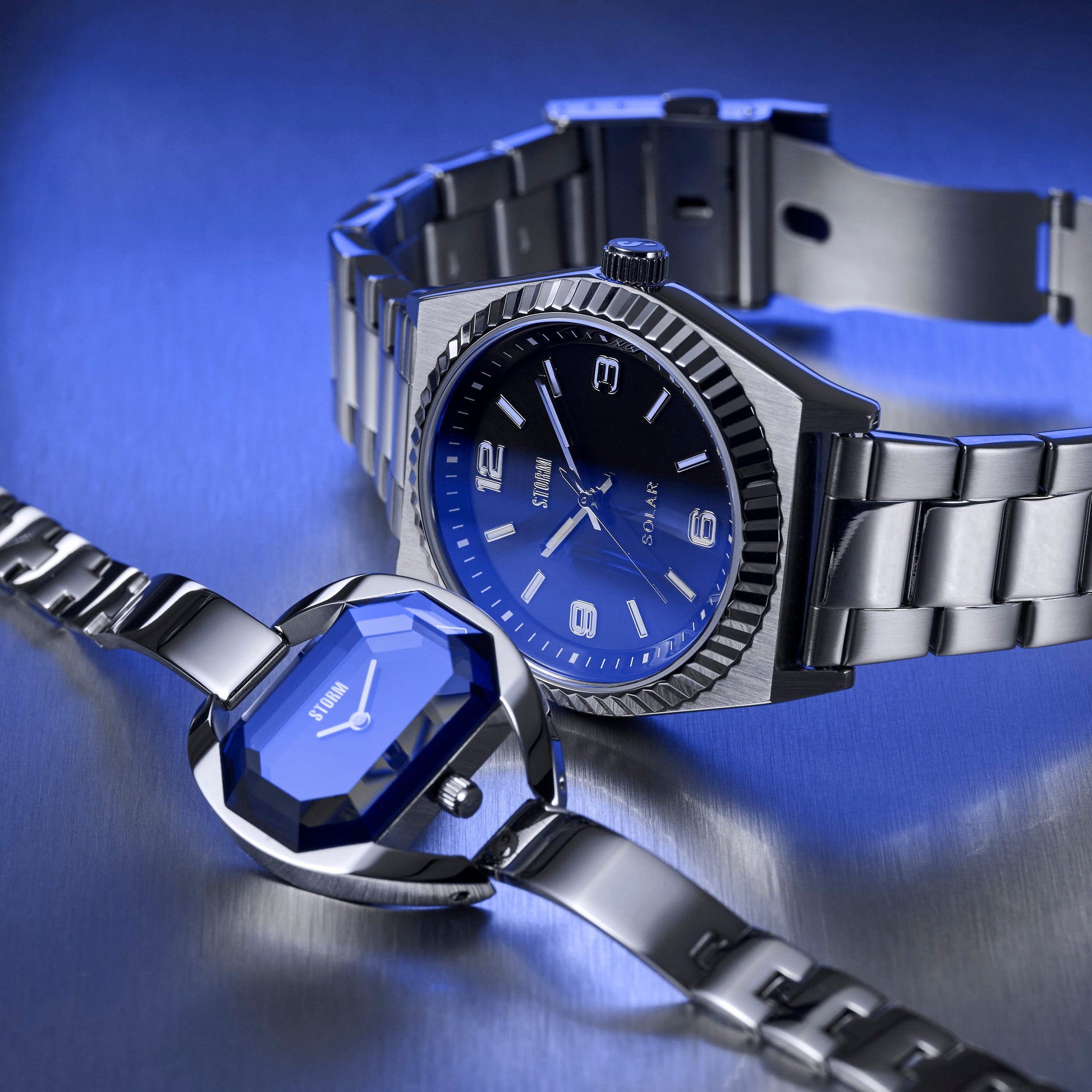 STORM TEMPTRESS CHARM LAZER BLUE WATCH & SUNSTONE LAZER BLUE SOLAR WATCH 2