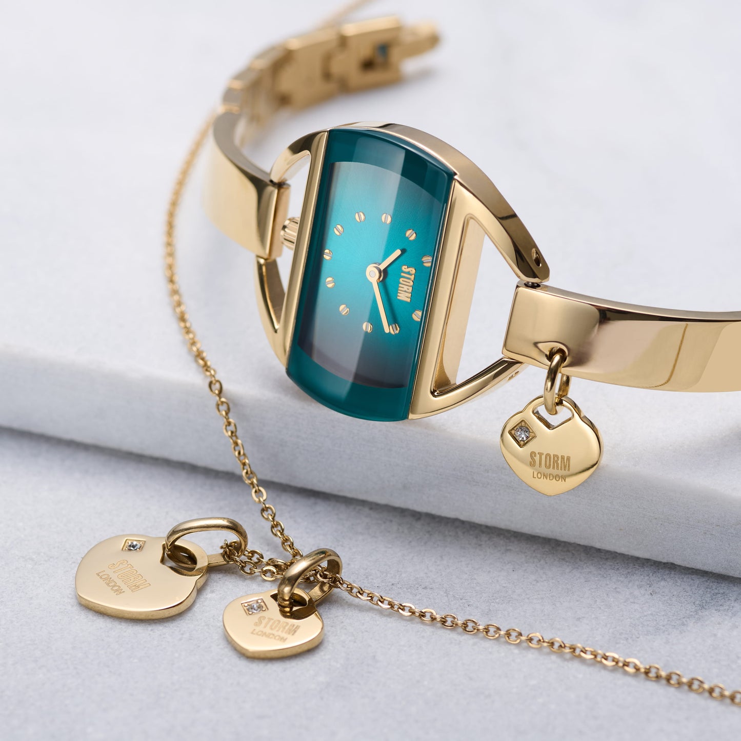 STORM TEMPTRESS CHARM GOLD-TEAL WITH HEART JEWELLERY